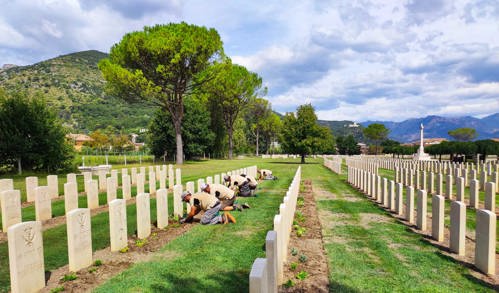 Gardeners work at Cassino war cemetery