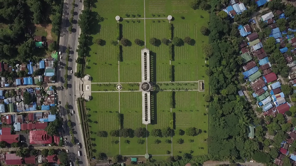 Oveheard view of the Rangoon Memorial and Taukkyan War Cemetery showing headline rows and overall cemetery.