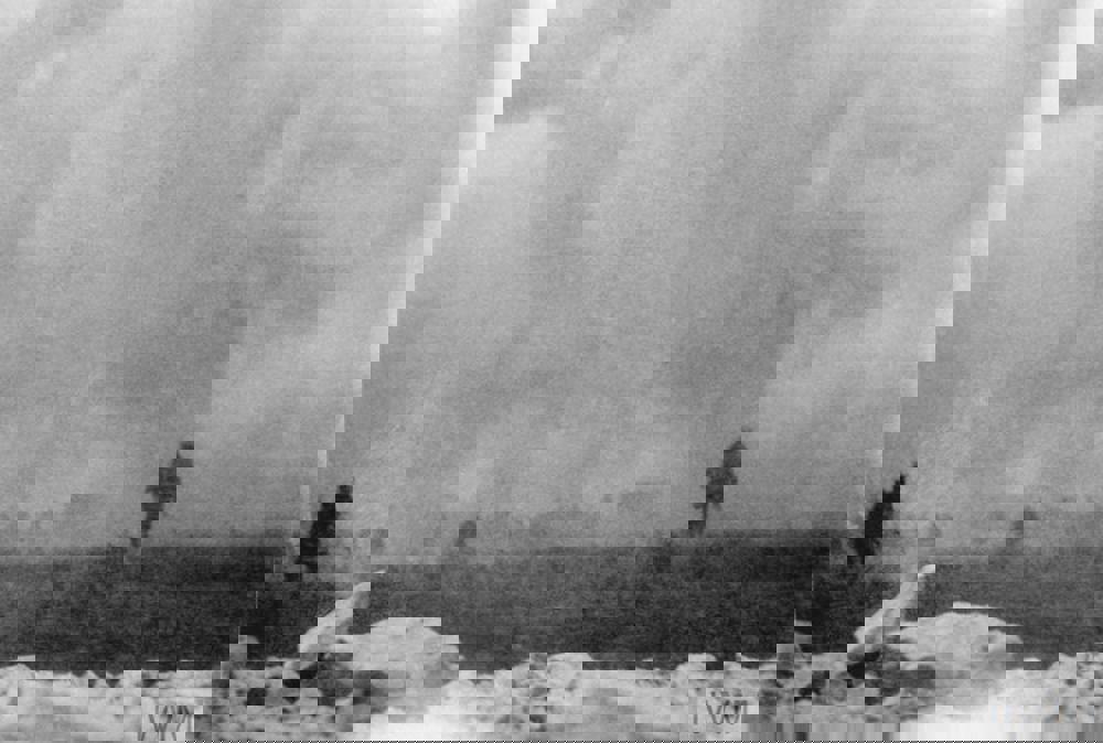 British troops advance through gas clouds during the Battle of Loos.