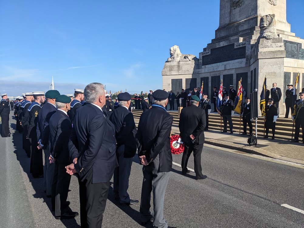 Royal Navy veterans and sailors attending a ceremony at Portsmouth Naval Memorial