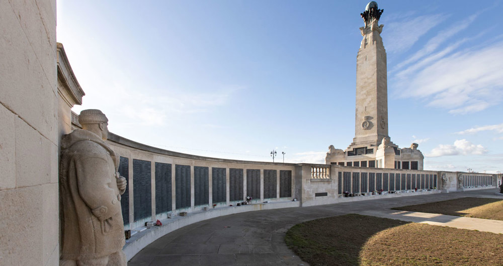 Curved memorial panel walls leading to central obelisk at Portsmouth Naval Memorial