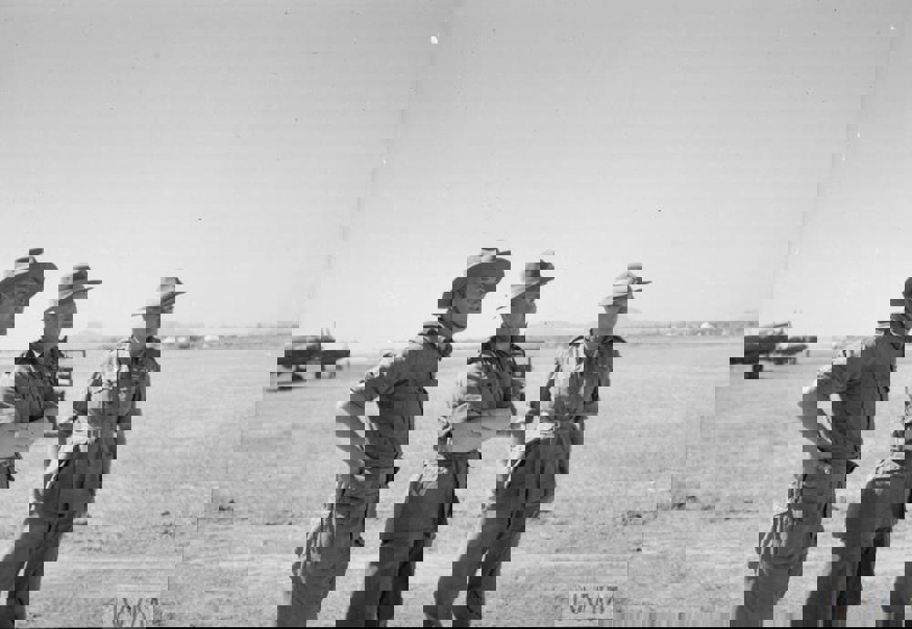 Air Vice Marshal S.F Vincent, Air Officer Commander-in-Chief of No. 221 Group RAF (centre), watches Hawker Hurricanes take off from Sadaung, Burma, on a strafing operation during the advance on Mandalay, with Lieutenant-General Sir William Slim, Commander of the 14th Army (right), and Group Captain D O Finlay, Commanding Officer of No. 906 Wing RAF (left).