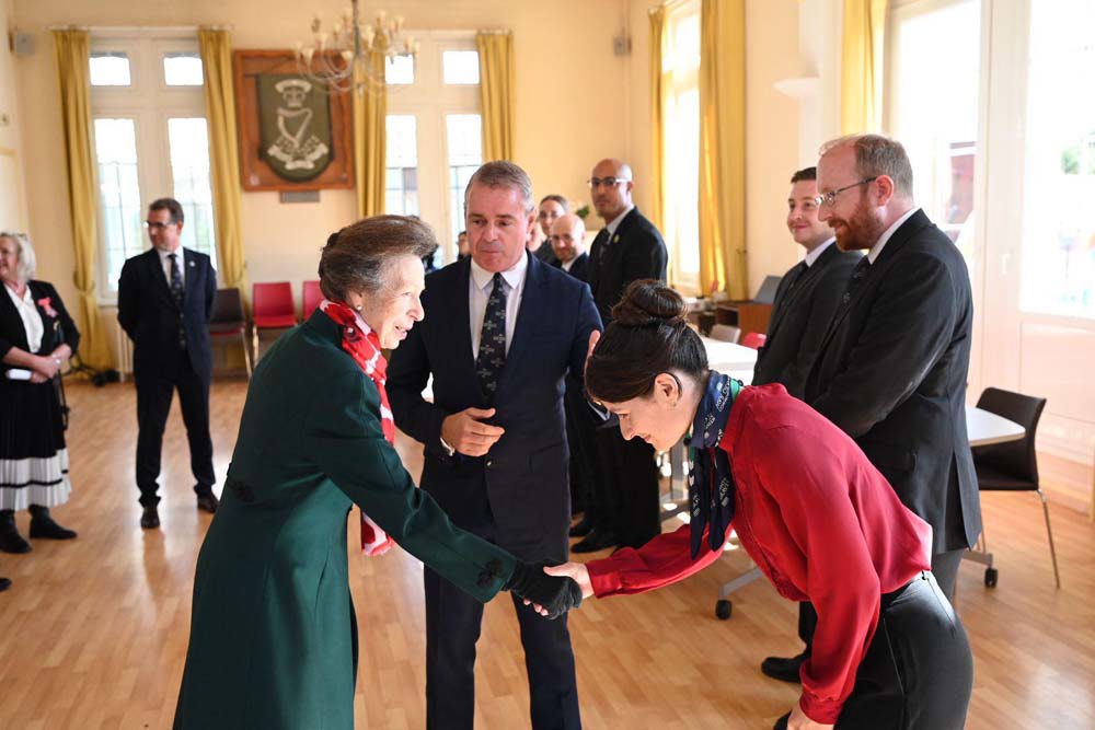 Princess Anne meets CWGC staff members at Loos-En-Gohelle Town Hall.