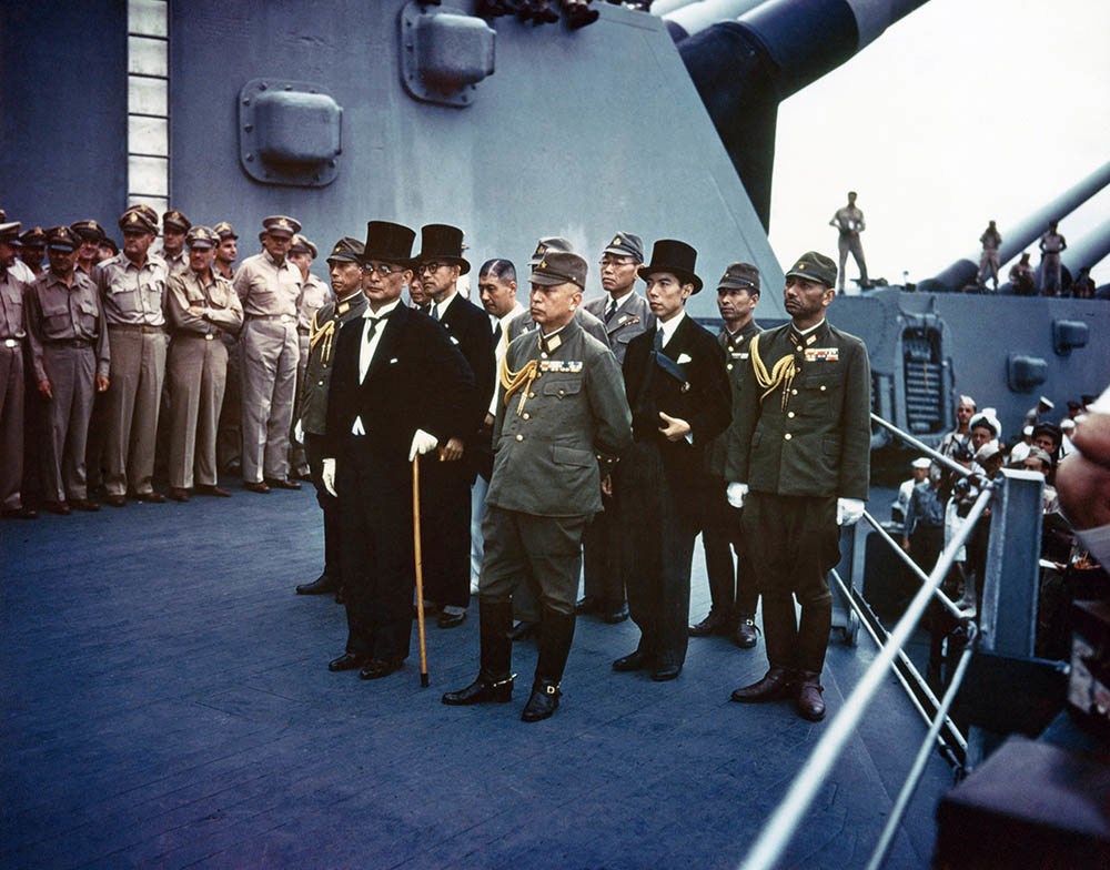Representatives of the Empire of Japan stand aboard USS Missouri prior to signing of the Instrument of Surrender
