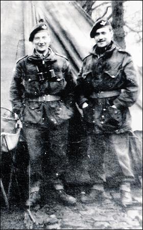 Richard Todd with Lieutenant Tony Bowler crica May 1944. They are wearing parachute officer's uniforms and berets.