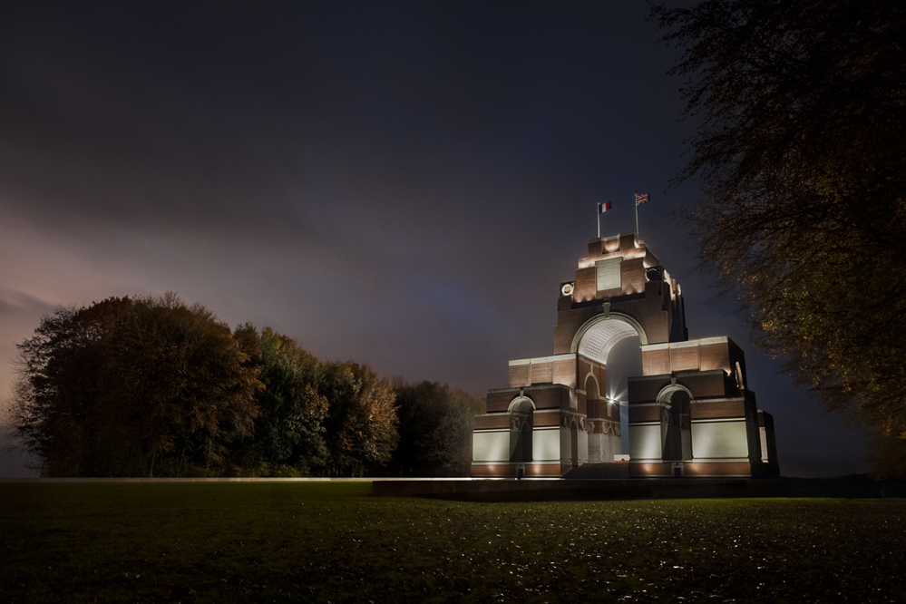 Thiepval Memorial illuminated at dusk