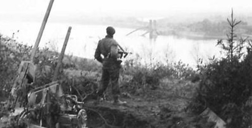 A solder stands by the Rhine Crossing in WW2
