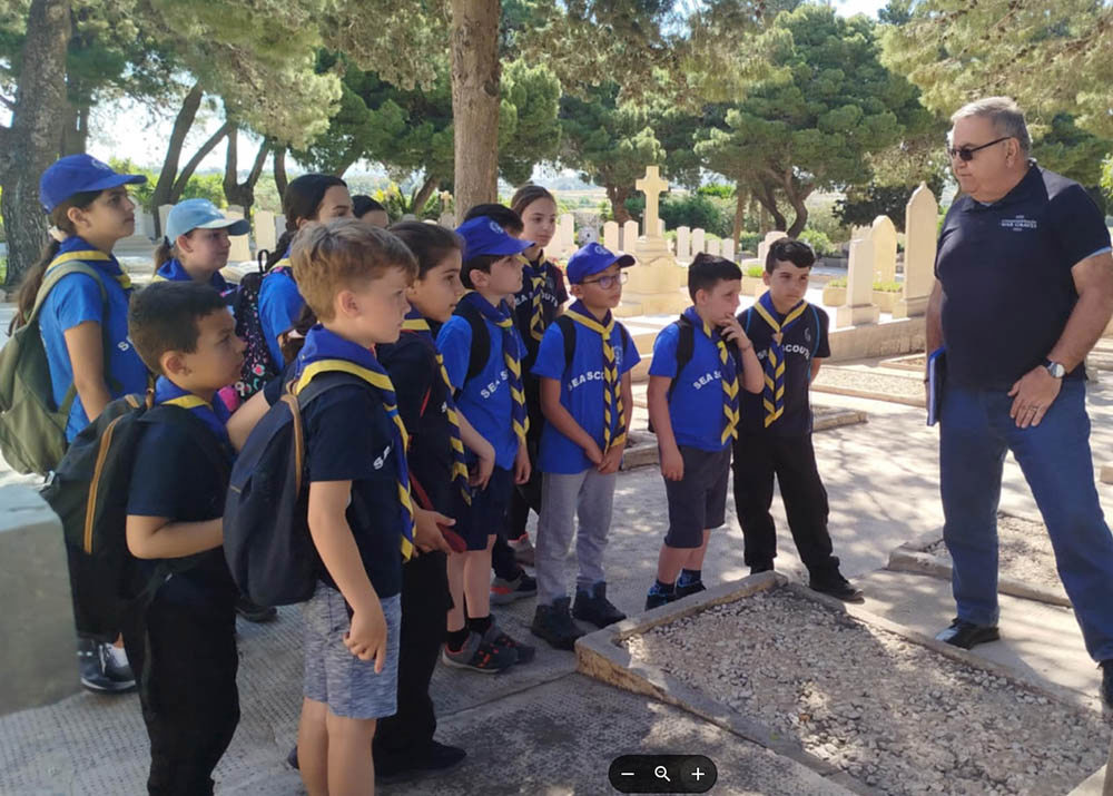 Seascouts visiting a CWGC cemetery during War Graves Week