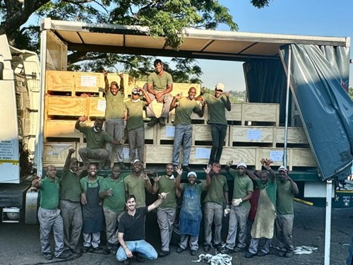 A proud Kaljon team in Durban pack up the shipment of Iroko Memorial posts for delivery to site in Cape Town