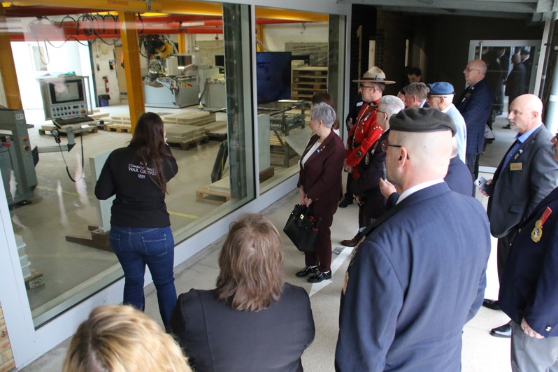 Guests at the CWGC Visitor Centre are given a guided tour by a CWGC staff member.