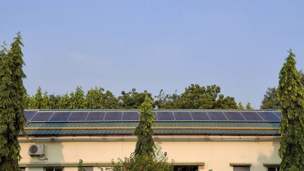 Solar panels installed on the roof of the work shed at Madras War Cemetery, Chennai.