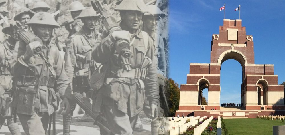 Image left shows British First World War machine gun soldiers marching with their weapons held over their shoulders before the image fades into a colour picture of the Thiepval Memorial, Somme.