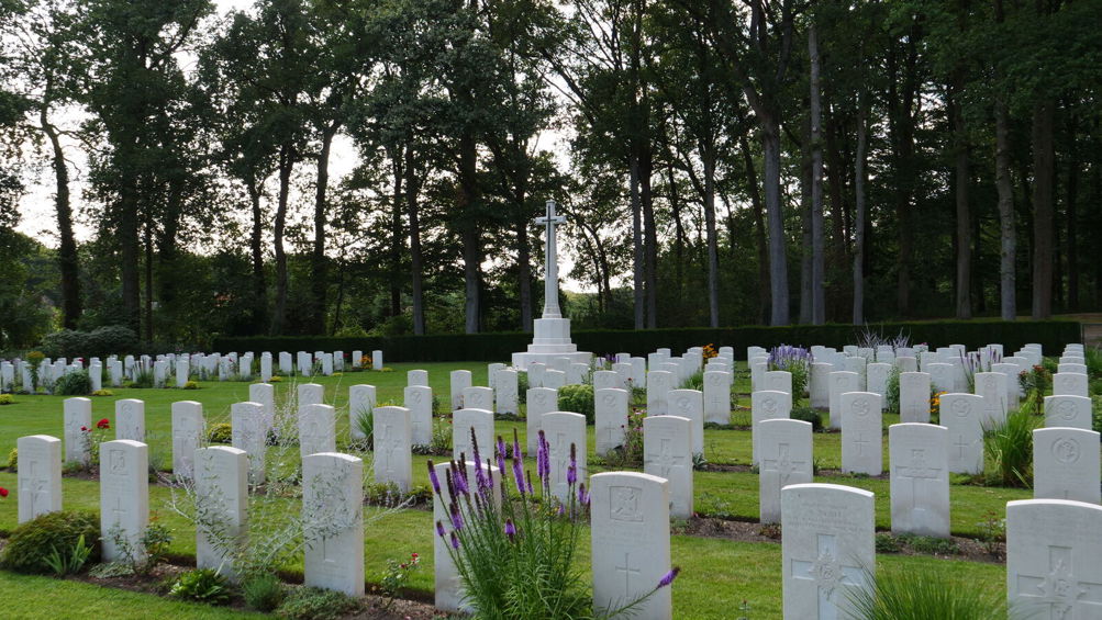 Cross of Sacrifice and headstones at Arnhem Oosterbeek War Cemetery