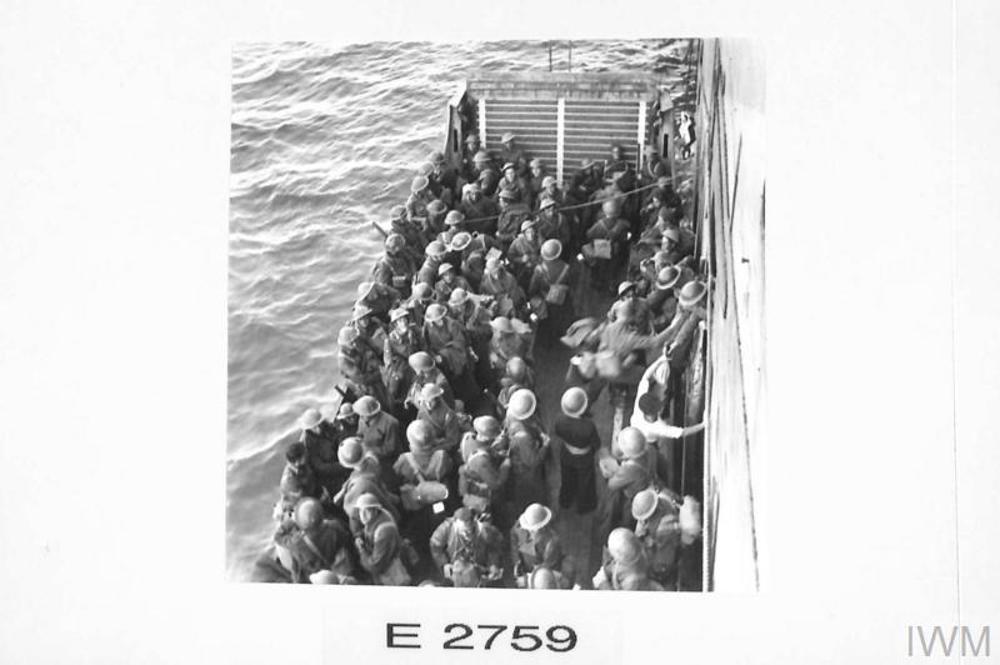 British soldiers packed onto a small landing craft during the evacuation of Greece.