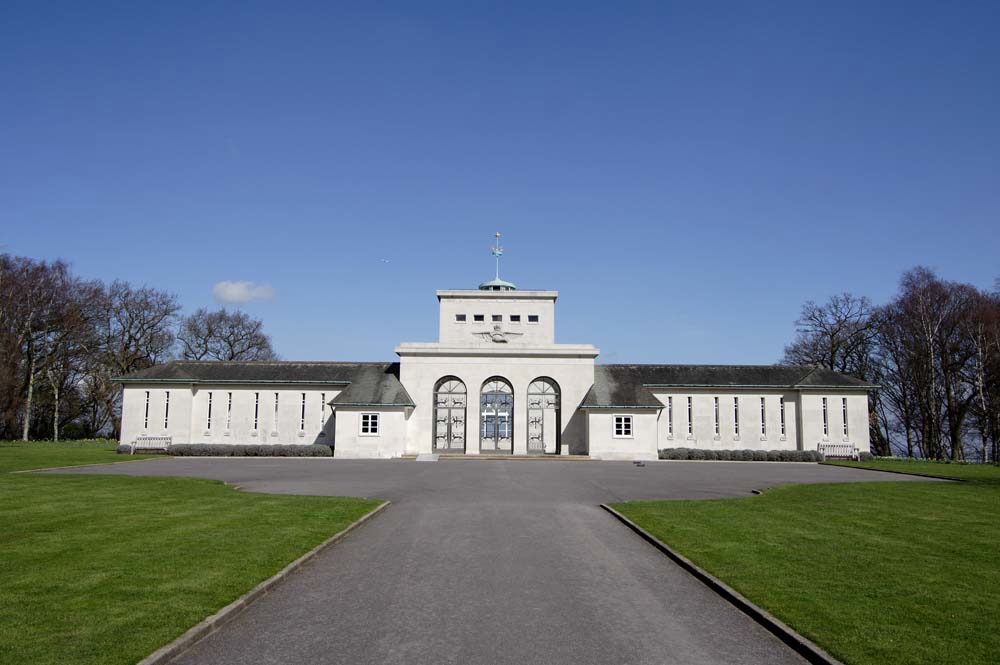 Entrance way of the Runnymede memorial showing three glazed archways and central tower.