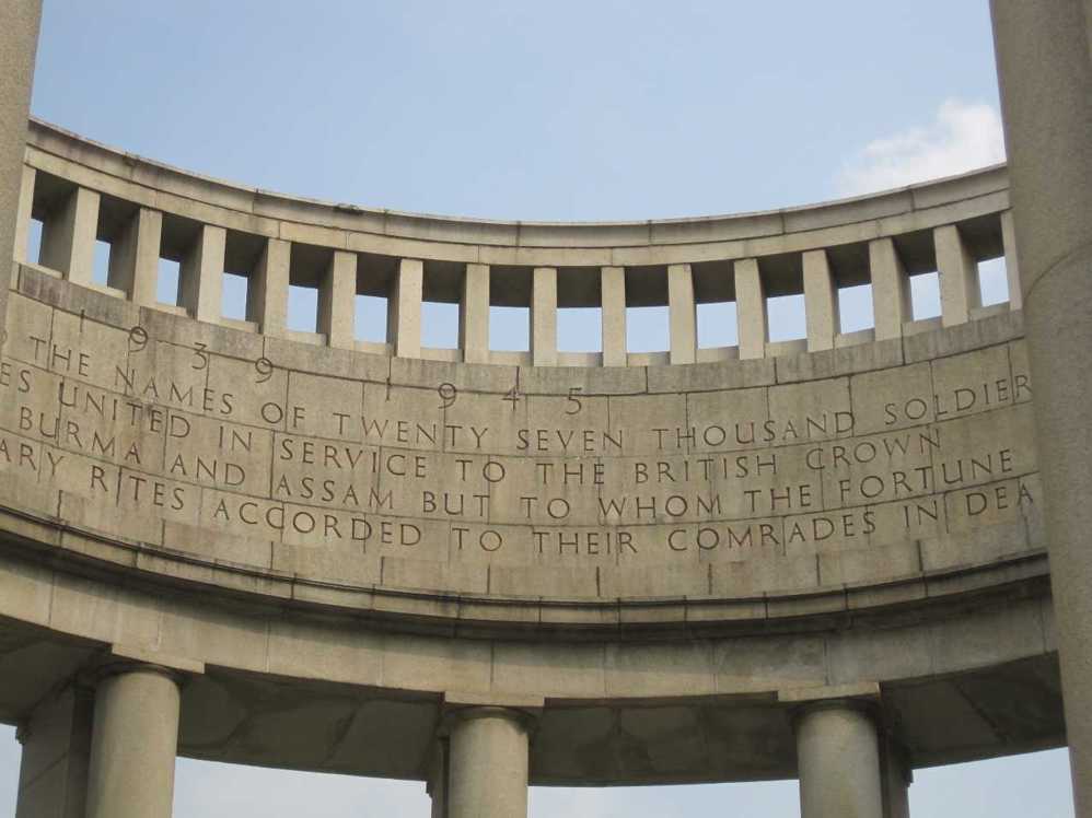 Descrption carved into the rotunda of the Rangoon Memorial, reading: 1939 - 1945, HERE ARE RECORDED THE NAMES OF TWENTY-SEVEN THOUSAND SOLDIERS OF MANY RACES UNITED IN SERVICE TO THE BRITISH CROWN WHO GAVE THEIR LIVES IN BURMA AND ASSAM BUT TO WHOM THE FORTUNE OF WAR DENIED THE CUSTOMARY RITES ACCORDED TO THEIR COMRADES IN DEATH.