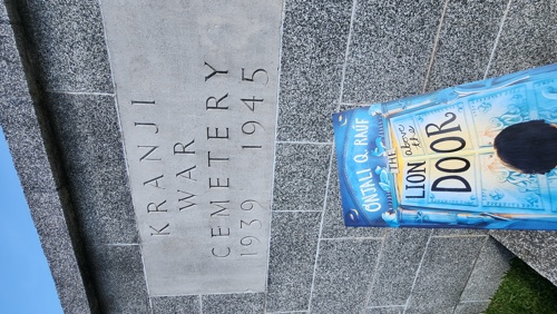 A copy of "The Lion Above the Door" at Krajni War Cemetery's stone entrance.