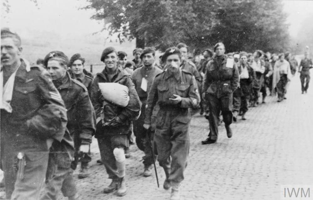 British Prisoners of War being marched through the streets of Arnhem following Operation Market Garden.