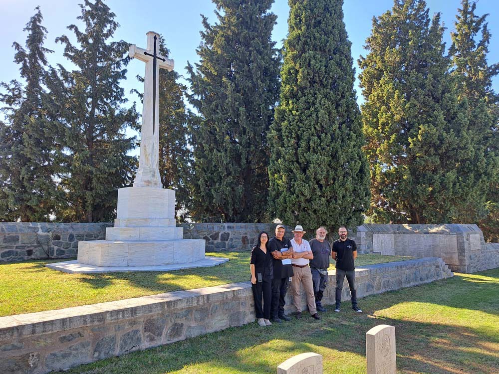 CWGC Vice Chairman Vice Admiral Peter Hudson with gardeners and staff at a Greek CWGC Cemetery