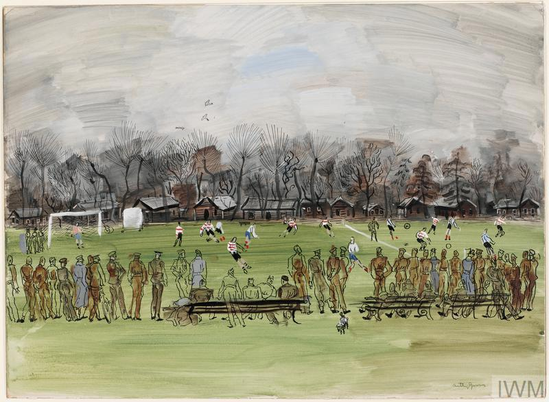 winter's day; a football match in an open field, with cricket screen, trees and buildings behind. A line of soldiers, some wearing grey coats, watches from the near touchline. A few are seated on benches.