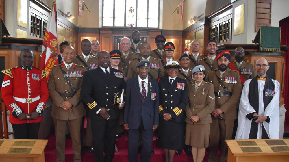 Military servicemen and priest in St George's Military Chapel