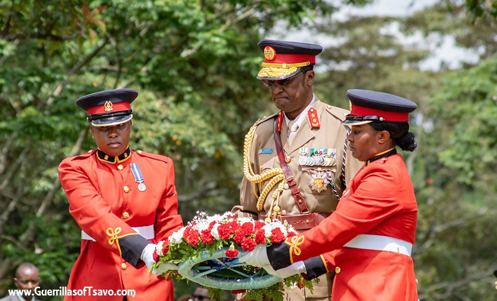 Members of the Kenyan Army laying a wreath in a CWGC cemetery during Remembrance Day ceremonies.