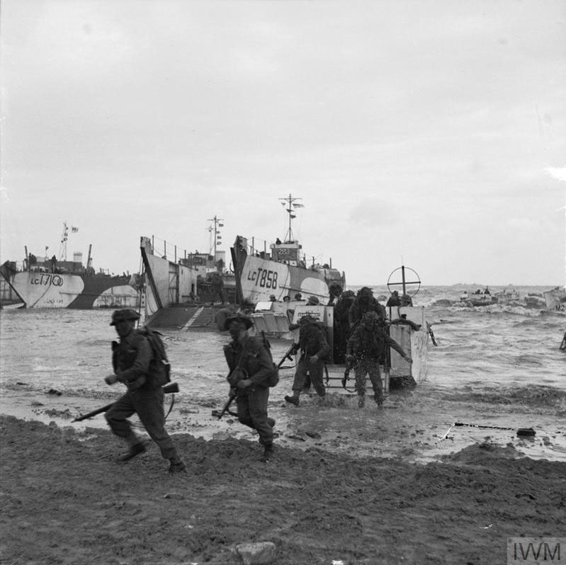 Soldiers of No.47 Commando coming ashore from their Landing Craft on D-Day.