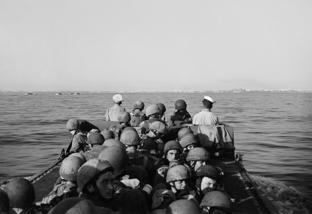 British Airborne troops approach Taranto in their landing craft.