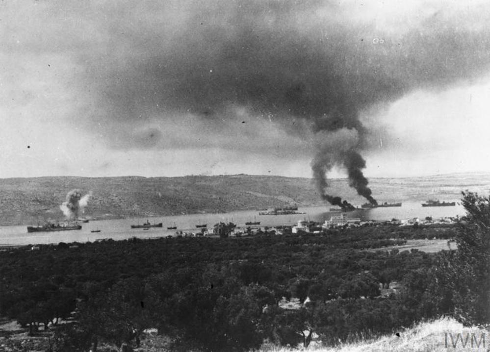 View of Suda Bay showing smoking Royal Navy ships hit by German fire during the Battle of Crete.