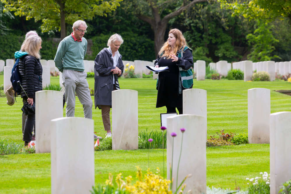 People in cemetery on tour