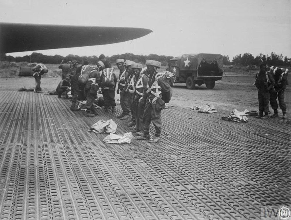 Gurkha paratroopers waiting to board their aircraft in Burma ahead of  Operation Dracula.