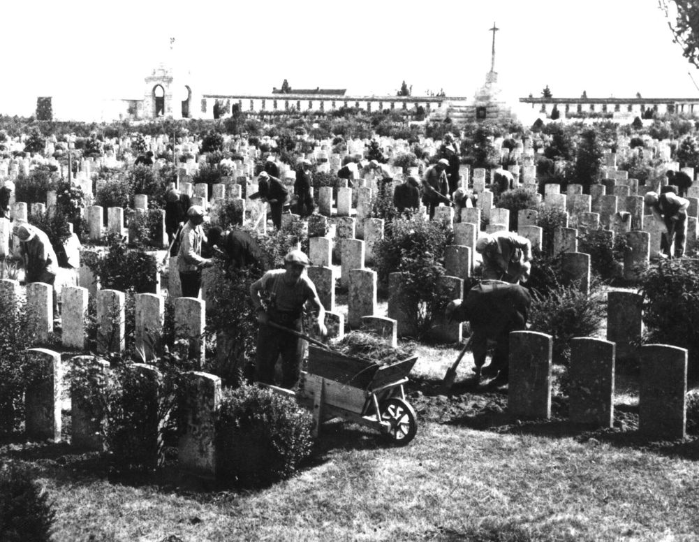 CWGC Staff and Belgian volunteers caring for Tyne Cot Cemetery in 1942.