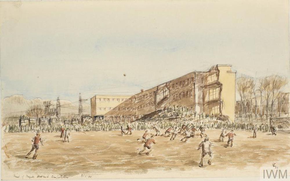 Painting of A football game being played on a dusty pitch in front of a three storey building.