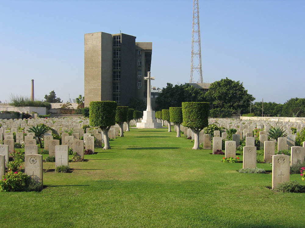 Cross of Sacrifice and headstones at Hadra War Cemetery, Alexandria, Egypt.