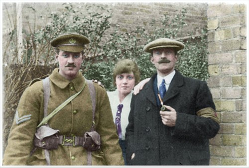 Corporal John Daly, left, in his infantry uniform stands with relatives in his back garden.