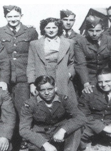 Mary Cremin, centered, poses for a photo with RAF aircrew and pilots.