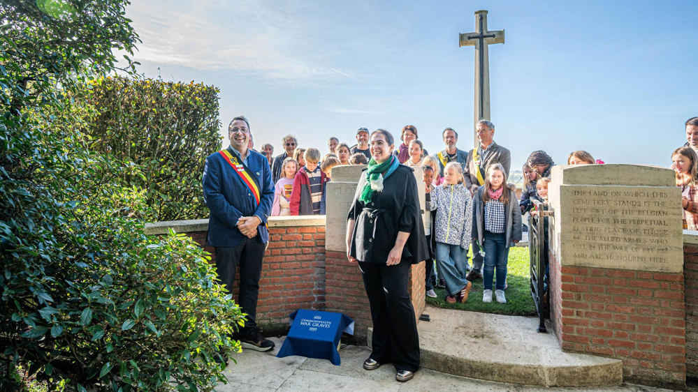 A jubilent crowd at the unveiling of an UNESCO world heritage plaque at Lone Tree Cemetery.