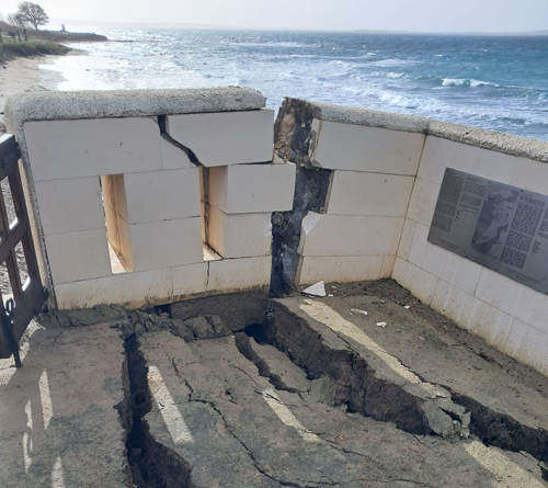 Structural damage at V Beach Cemetery