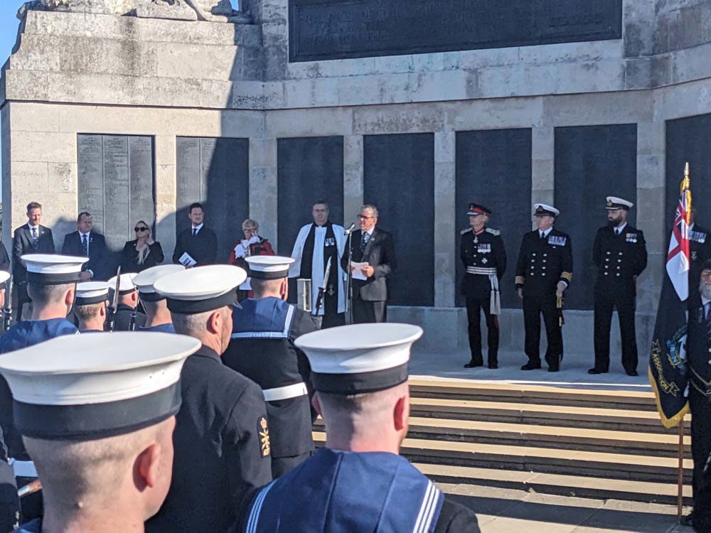 Man gives speech on Naval Memorial