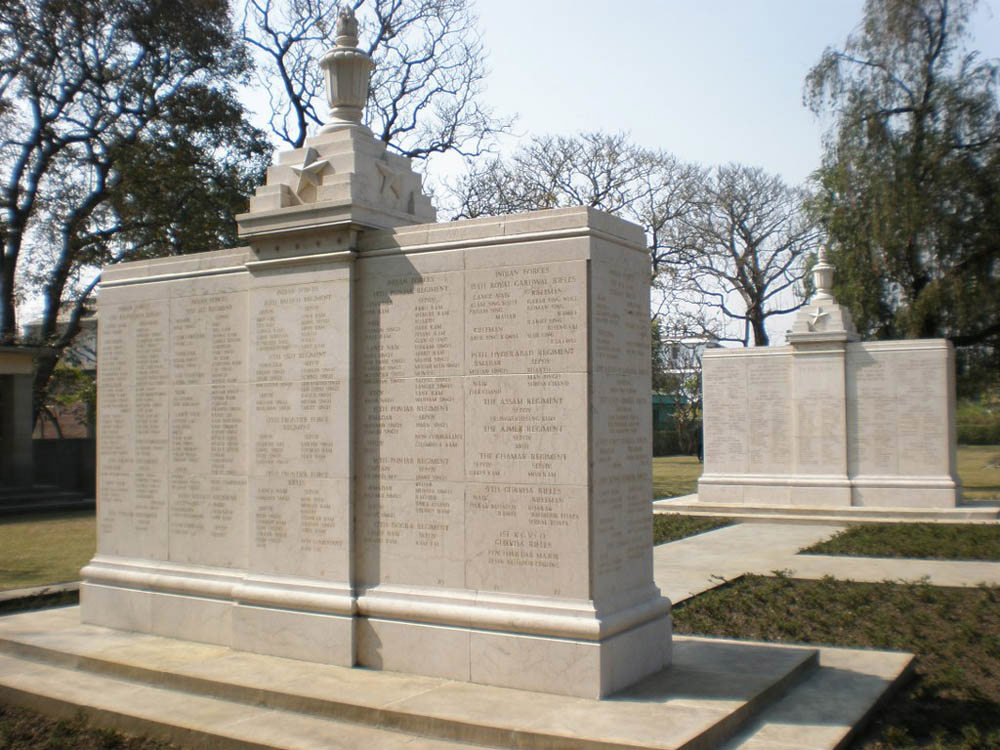 Stone Pullars topped with Indian-style pedastal toppers and architectural features making up the Imphal Cremation Memorial