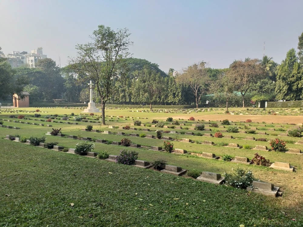 Row of bronz-faced stone grave markers at Chungkai War Cemetery.