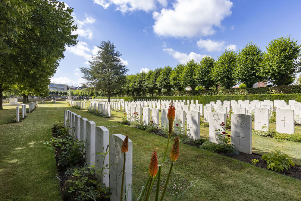 Rows of CWGC headstones at Ypres Town Cemetery Extension