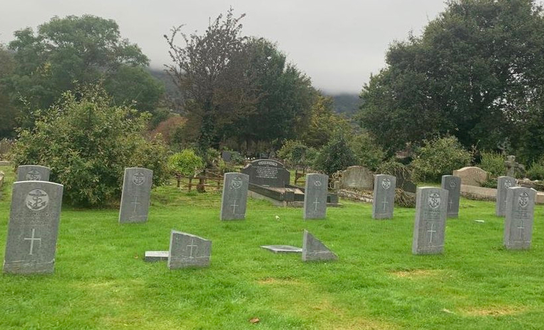 Vandalism to war graves at Belfast City Cemetery