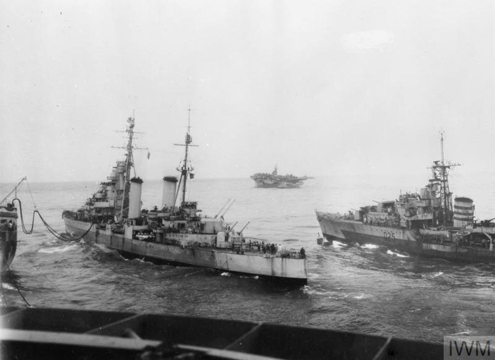 Ships of the British Pacific Fleet with an Aircraft visible in the background.