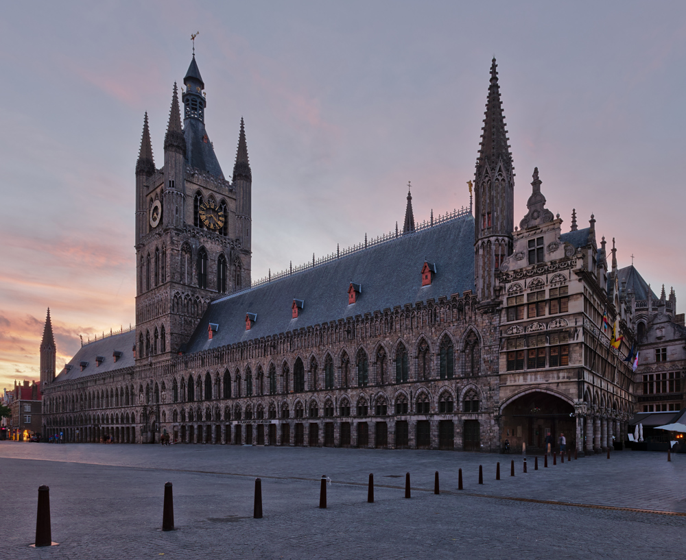 Ypres Cloth Hall and central market place in twilight.