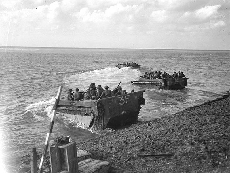 Canadian soldiers in Buffalo amphibious transport vehicles come ashore during the Battle of the Scheldt