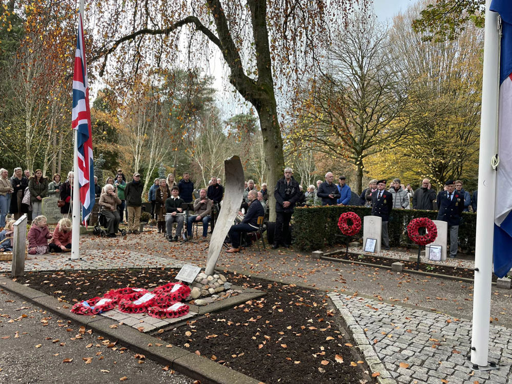 People gathered to lay wreaths on the CWGC war graves at Nunspreet Cemetery, the Netherlands.