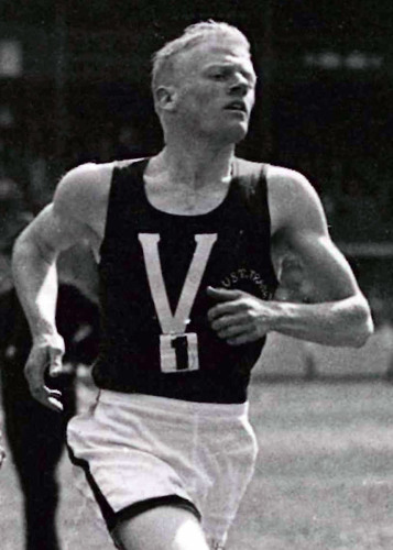 Gerald Backhouse competing in a black singlet and white vests at some point in the 1930s