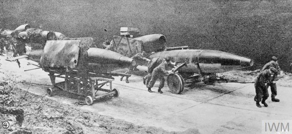 German crews moving V-1 Flying Bombs to their launch site on carts.