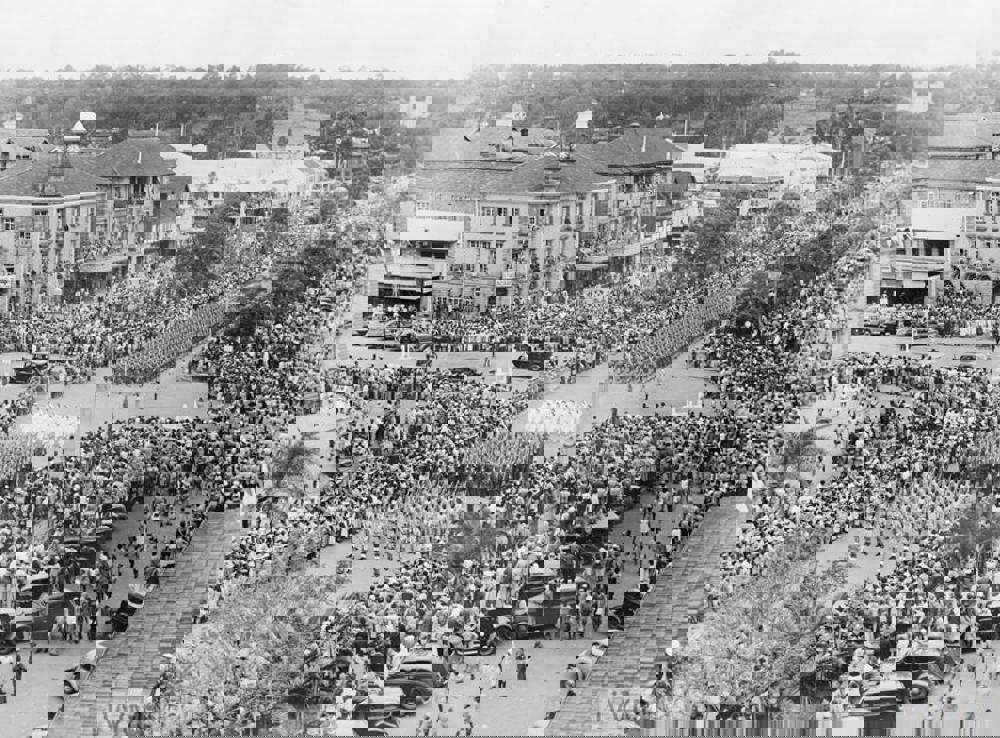 Military units parade through downtown Nairobi, Kenya, on VJ Day 1945.